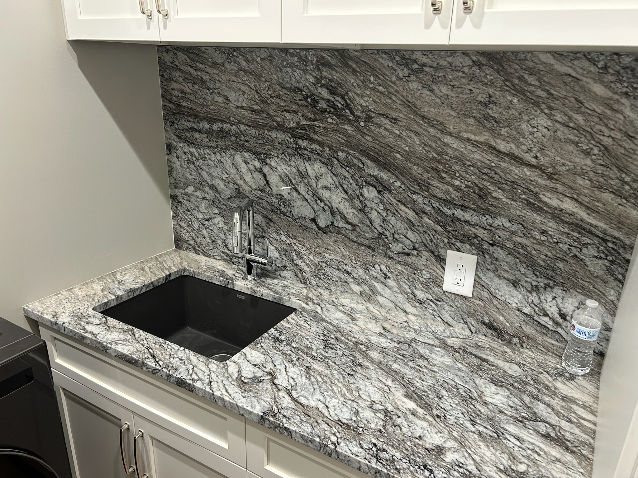 White granite laundry room